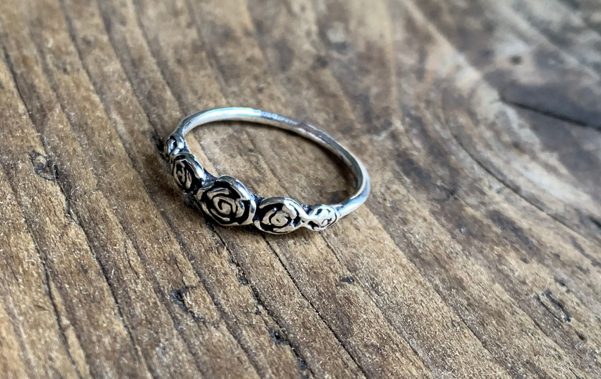 Silver rose cluster ring,