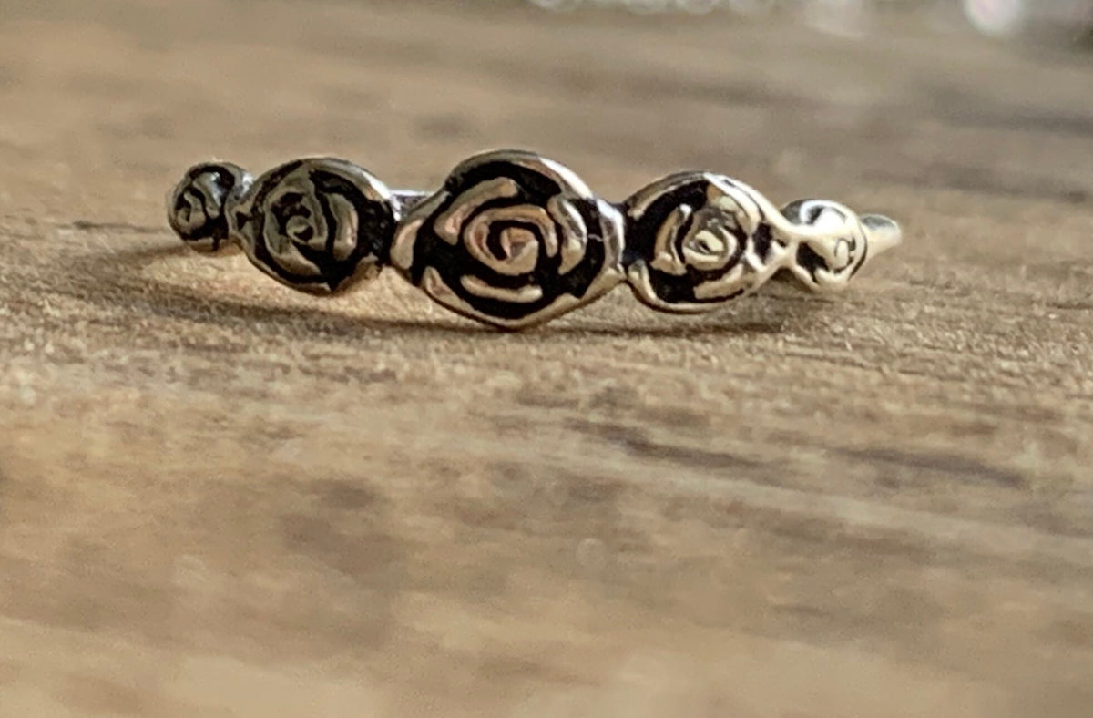 Silver rose cluster ring,