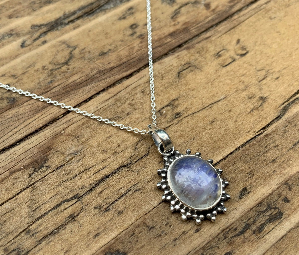 Sterling Silver Oval Starburst Rainbow Moonstone Necklace by Springwaves