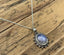 Sterling Silver Oval Starburst Rainbow Moonstone Necklace by Springwaves