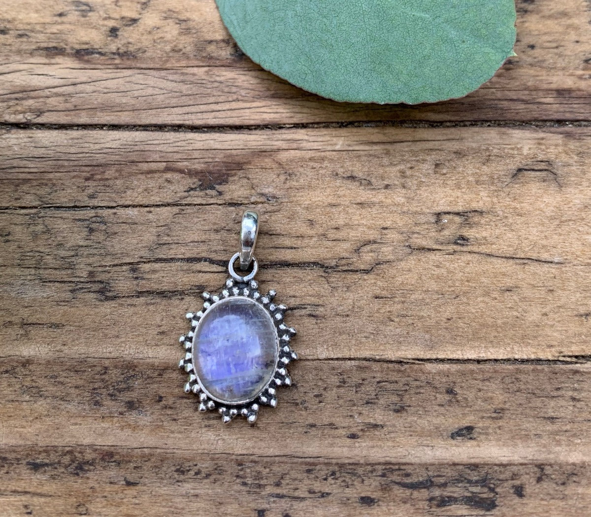 Sterling Silver Oval Starburst Rainbow Moonstone Necklace by Springwaves