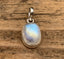 Sterling Silver Classic Oval Rainbow Moonstone Necklace by Springwaves