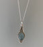 Delicate Ornate Silver Oval Aquamarine Necklace by Springwaves
