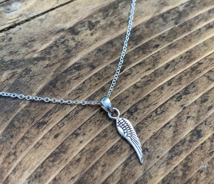 Tiny Silver Wing Charm Necklace