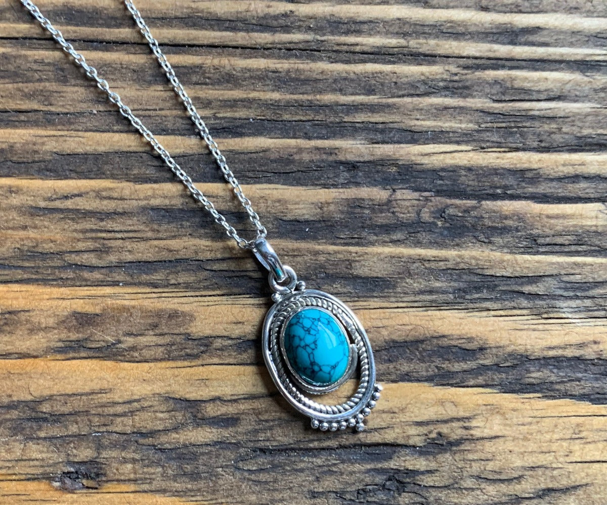 Boho Turquoise Ornate Oval Necklace by Springwaves