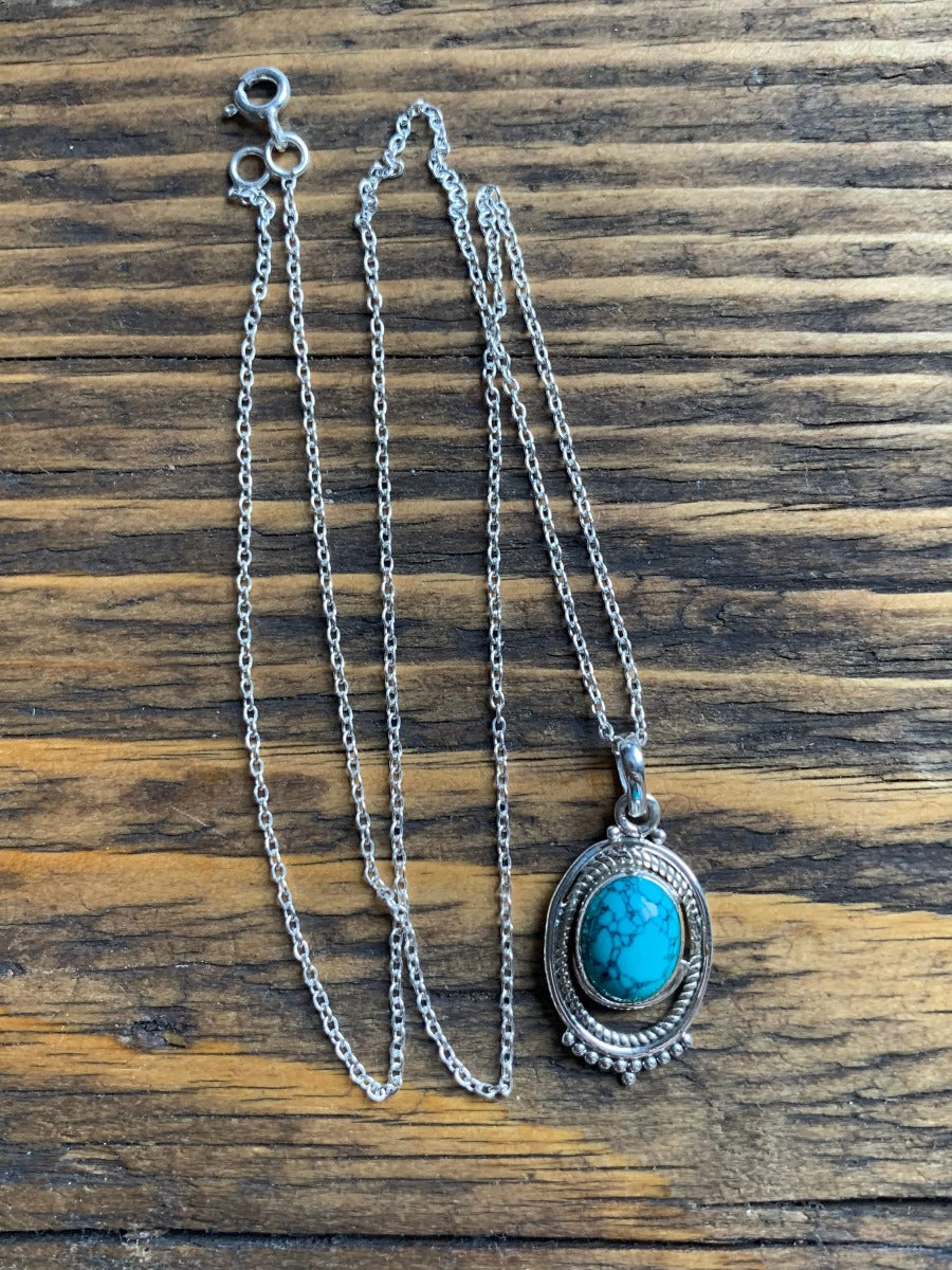 Boho Turquoise Ornate Oval Necklace by Springwaves