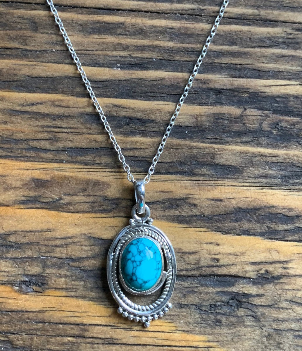 Boho Turquoise Ornate Oval Necklace by Springwaves