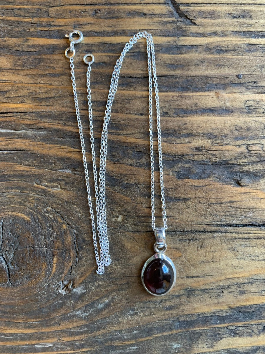 Sterling Silver Classic Oval Garnet Necklace Pendant by Springwaves