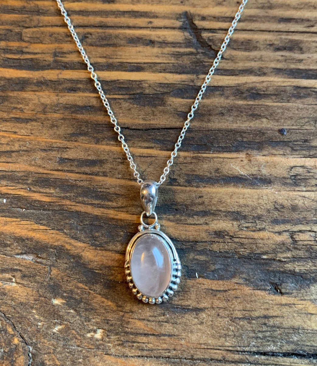 Sterling Silver Oval Pink Quartz Necklace by Springwaves