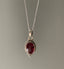 Sterling Silver Boho Oval Garnet Necklace Pendant by Springwaves