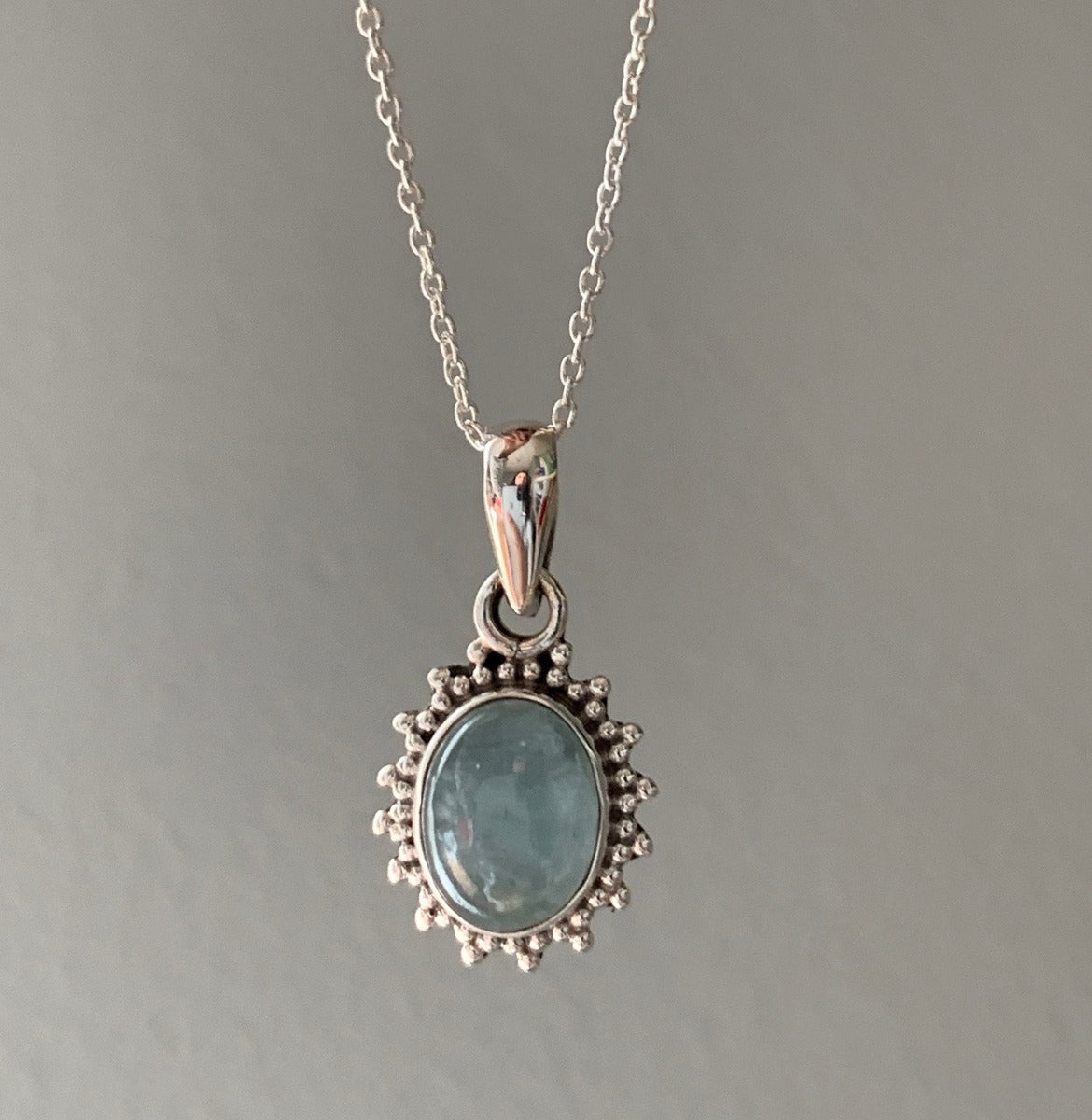 Sterling Silver Oval Starburst Aquamarine Necklace by Springwaves