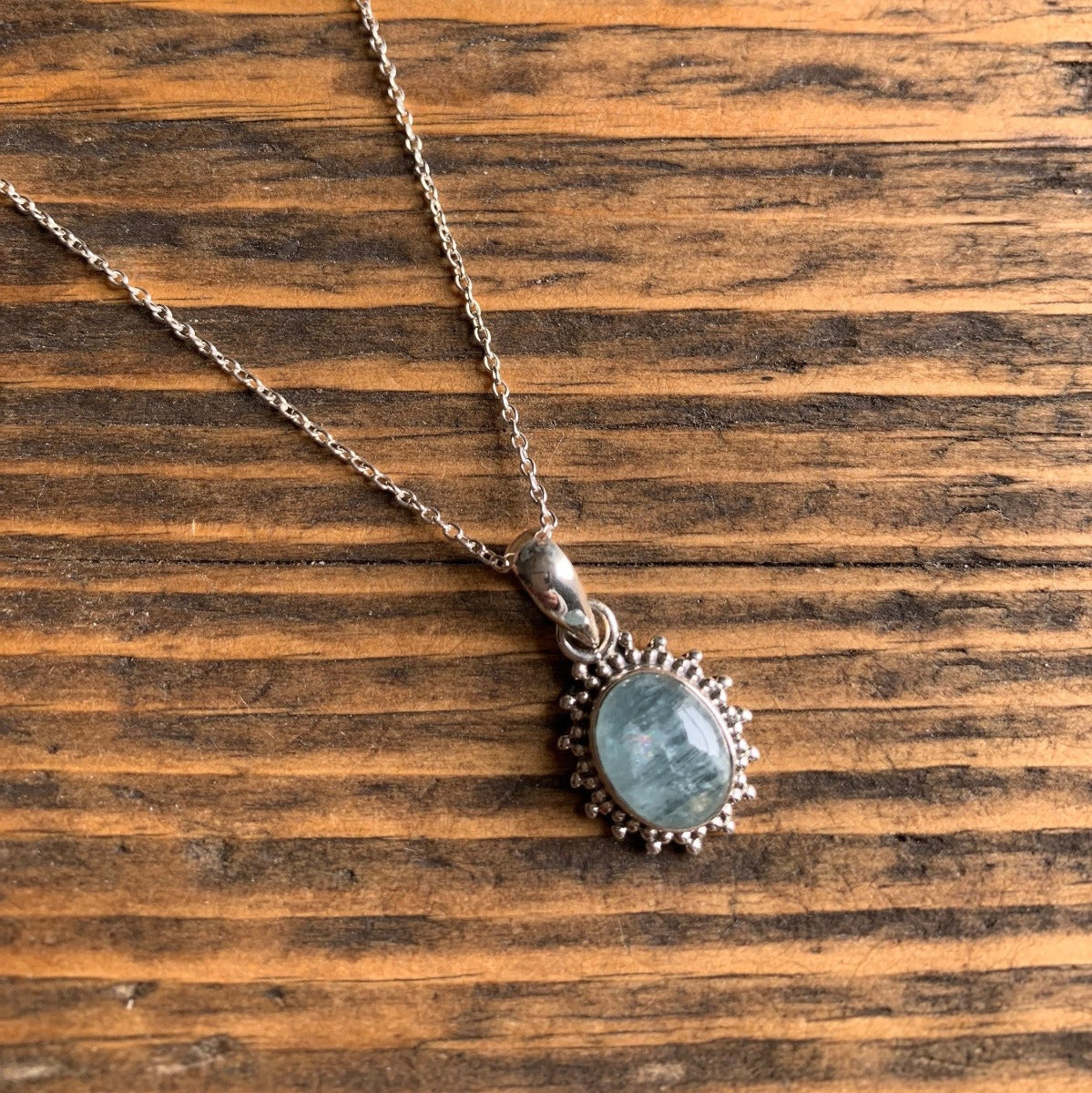 Sterling Silver Oval Starburst Aquamarine Necklace by Springwaves