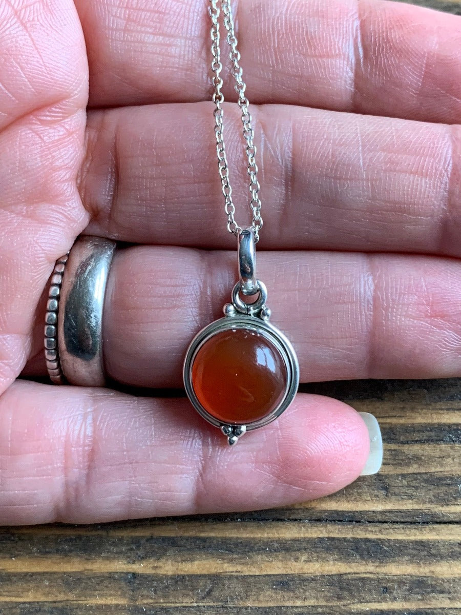 Delicate Round Carnelian Pendant Necklace by Springwaves