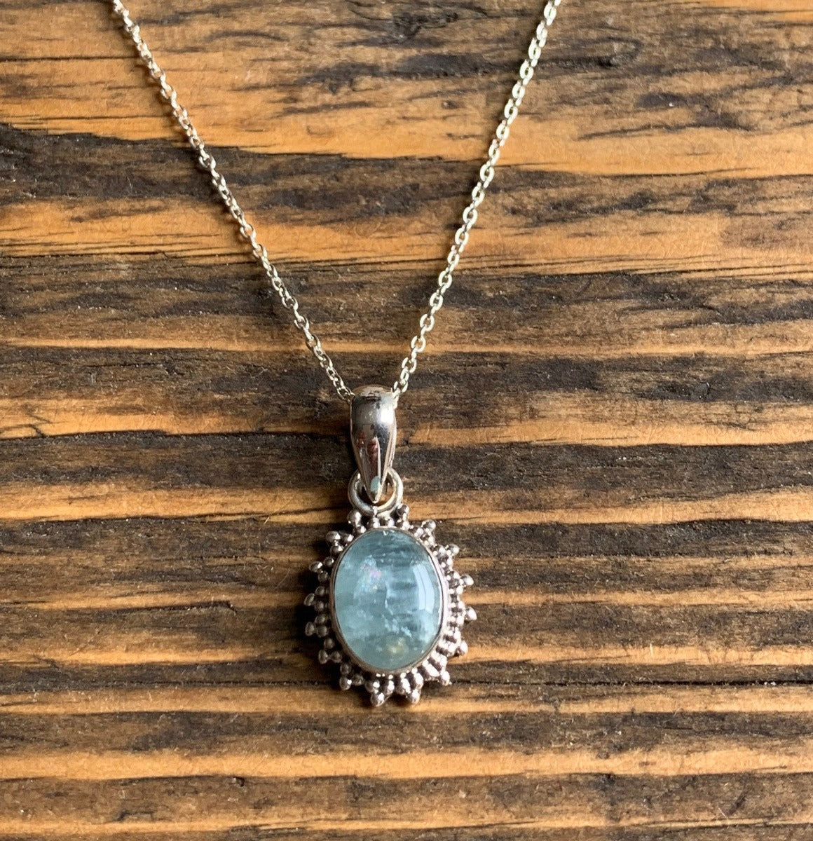Sterling Silver Oval Starburst Aquamarine Necklace by Springwaves