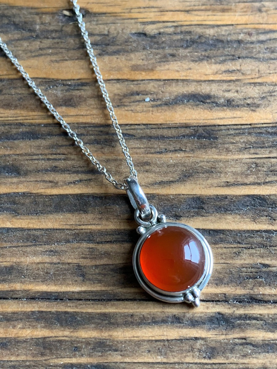 Delicate Round Carnelian Pendant Necklace by Springwaves