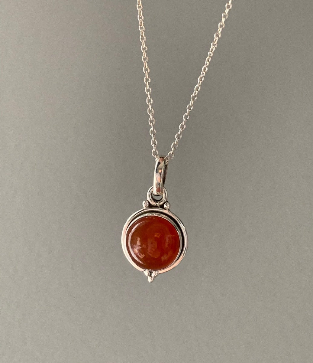 Delicate Round Carnelian Pendant Necklace by Springwaves