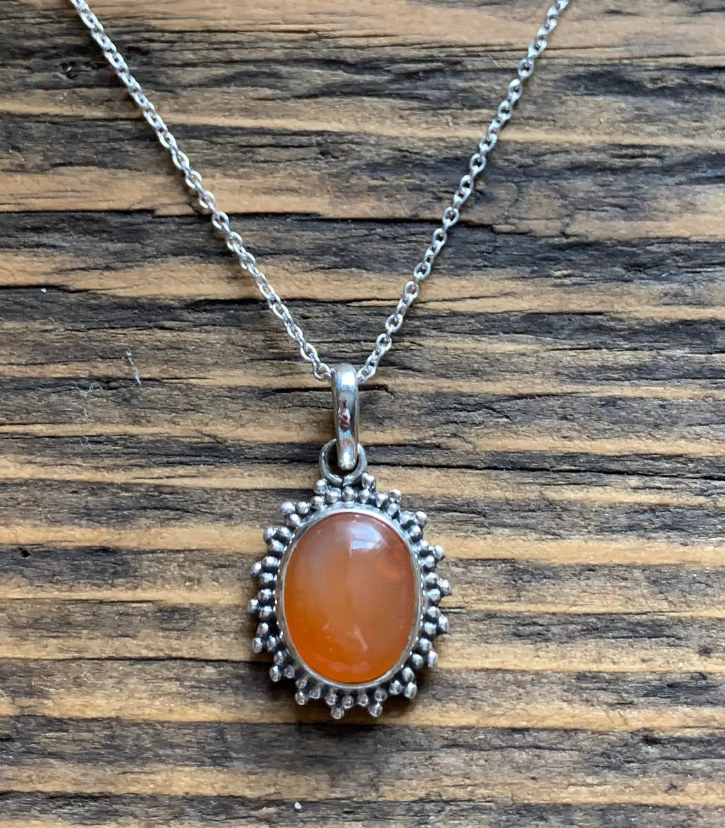 Sterling Silver Oval Starburst Carnelian Necklace by Springwaves