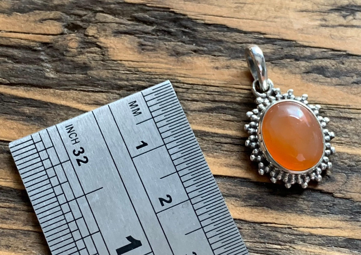 Sterling Silver Oval Starburst Carnelian Necklace by Springwaves