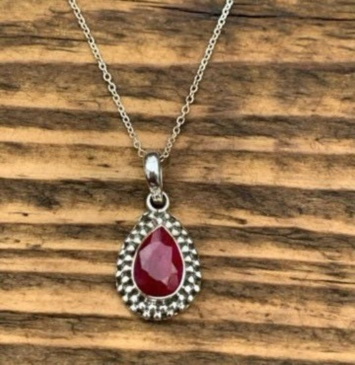 Silver Framed Faceted Ruby Teardrop Necklace