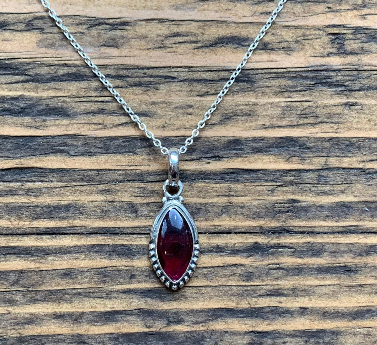 Sterling Silver Almond Garnet Necklace by Springwaves