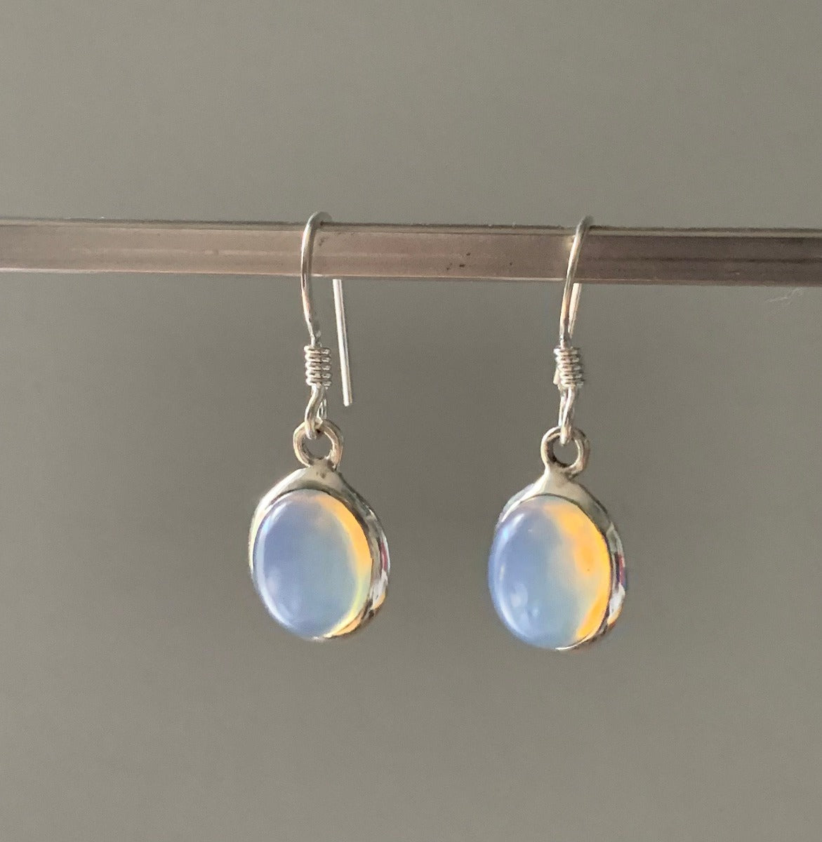 Classic Oval Silver Opalite Drop Earrings by Springwaves