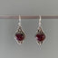 Delicate Ornate Silver Garnet Drop Earrings by Springwaves