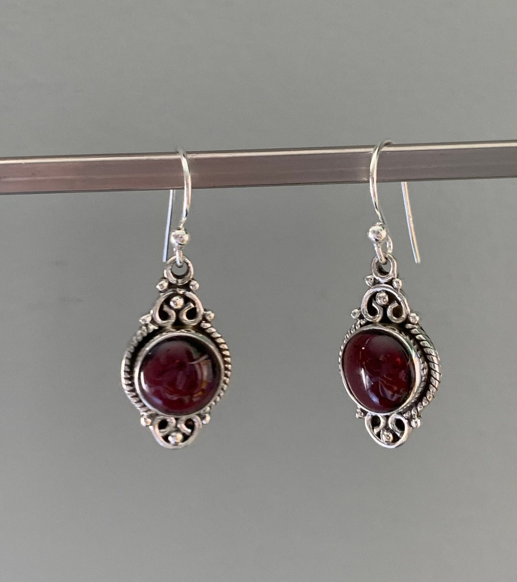 Delicate Ornate Silver Garnet Drop Earrings by Springwaves