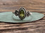 Delicate Faceted Peridot Period Ring by Springwaves