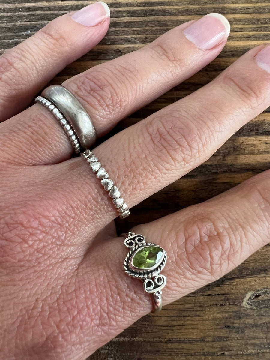 Delicate Faceted Peridot Period Ring by Springwaves