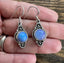 Delicate Ornate Silver Opalite Drop Earrings by Springwaves