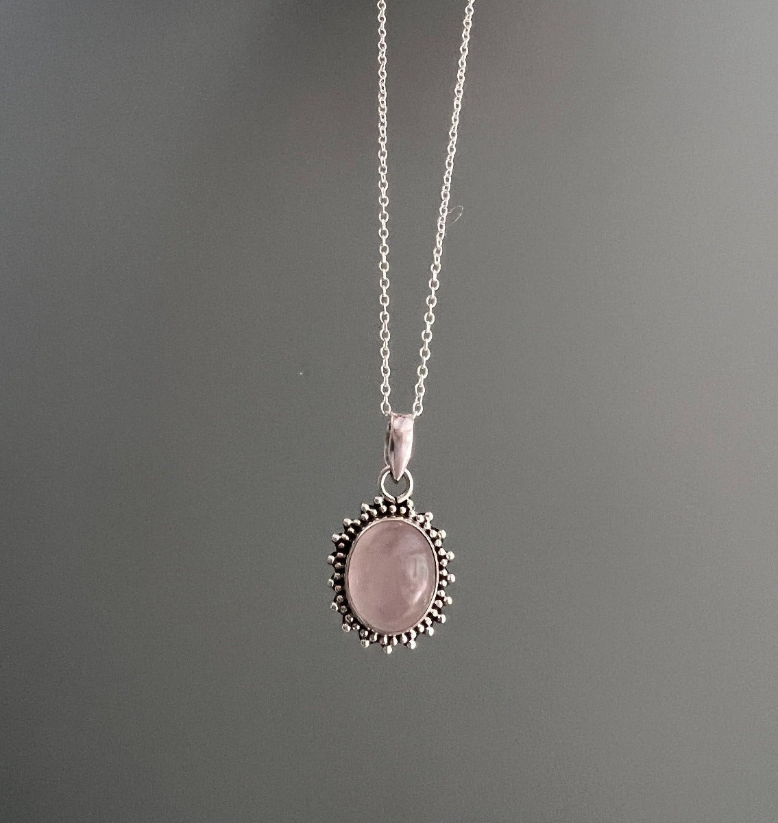 Sterling Silver Oval Starburst Rose Quartz Necklace by Springwaves