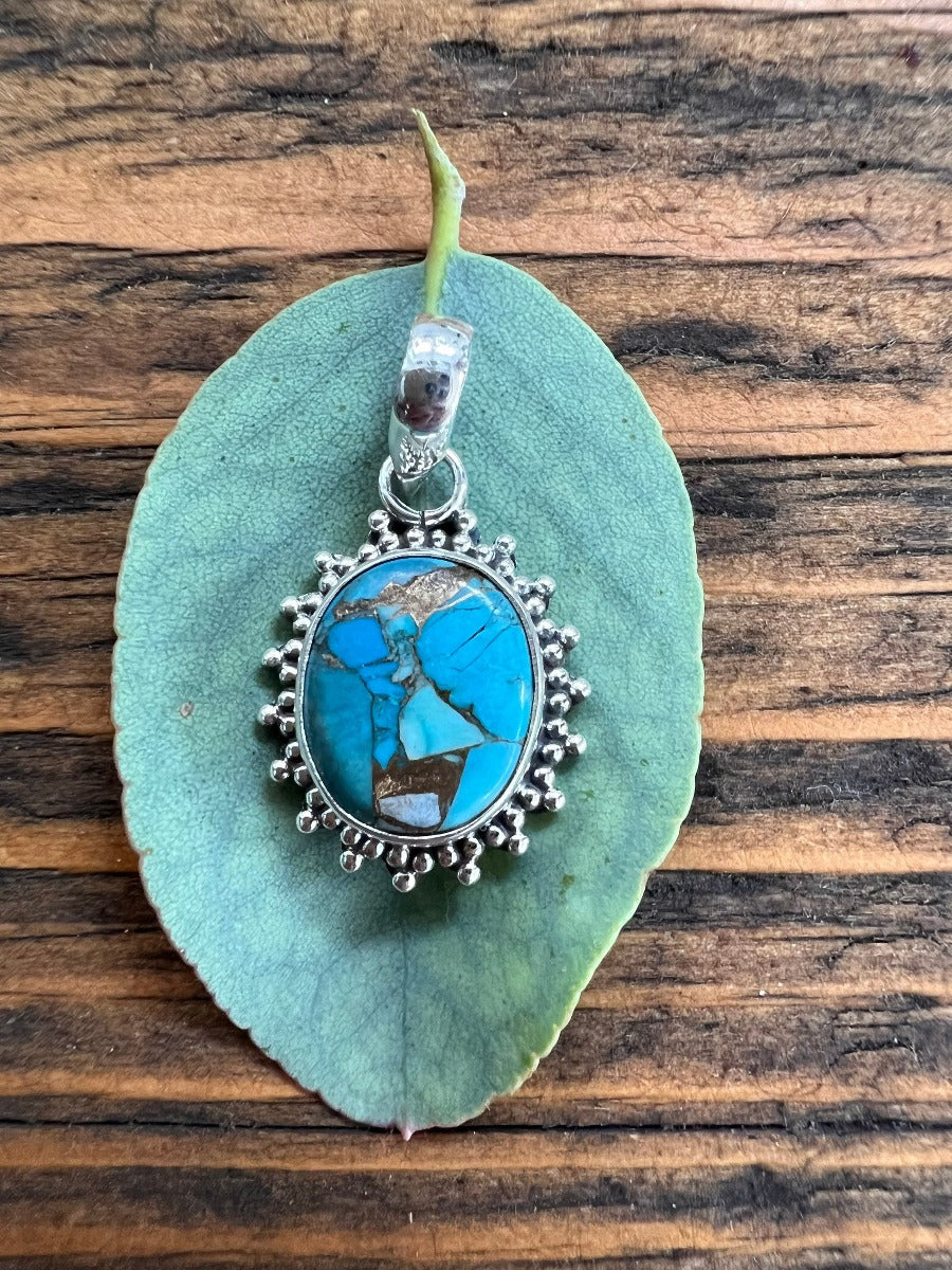 Sterling Silver Oval Starburst Turquoise Necklace by Springwaves