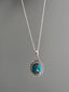 Sterling Silver Oval Starburst Turquoise Necklace by Springwaves
