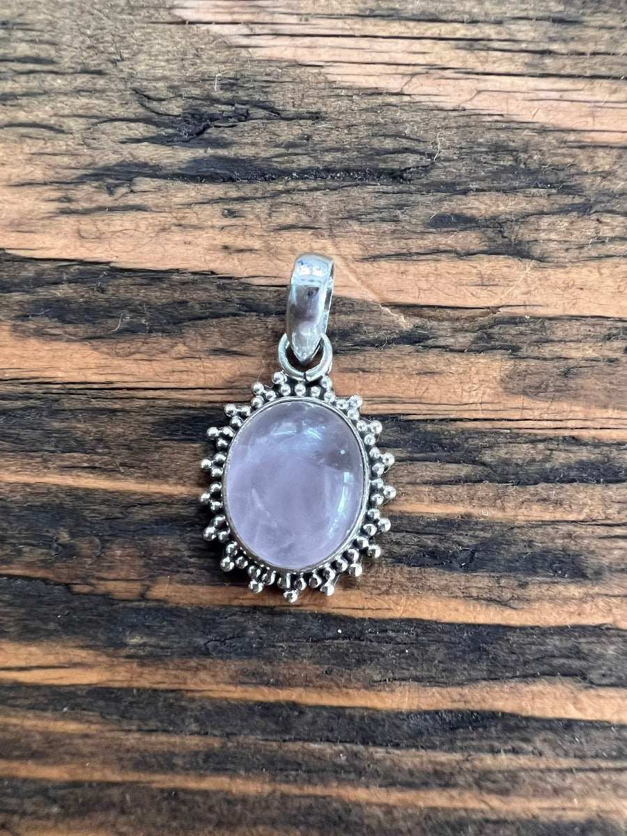 Sterling Silver Oval Starburst Rose Quartz Necklace by Springwaves