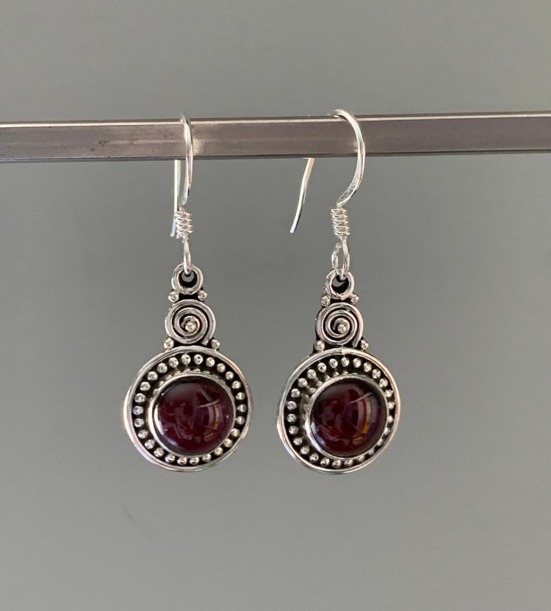 Ornate Round Boho Garnet Silver Drop Earrings by Springwaves